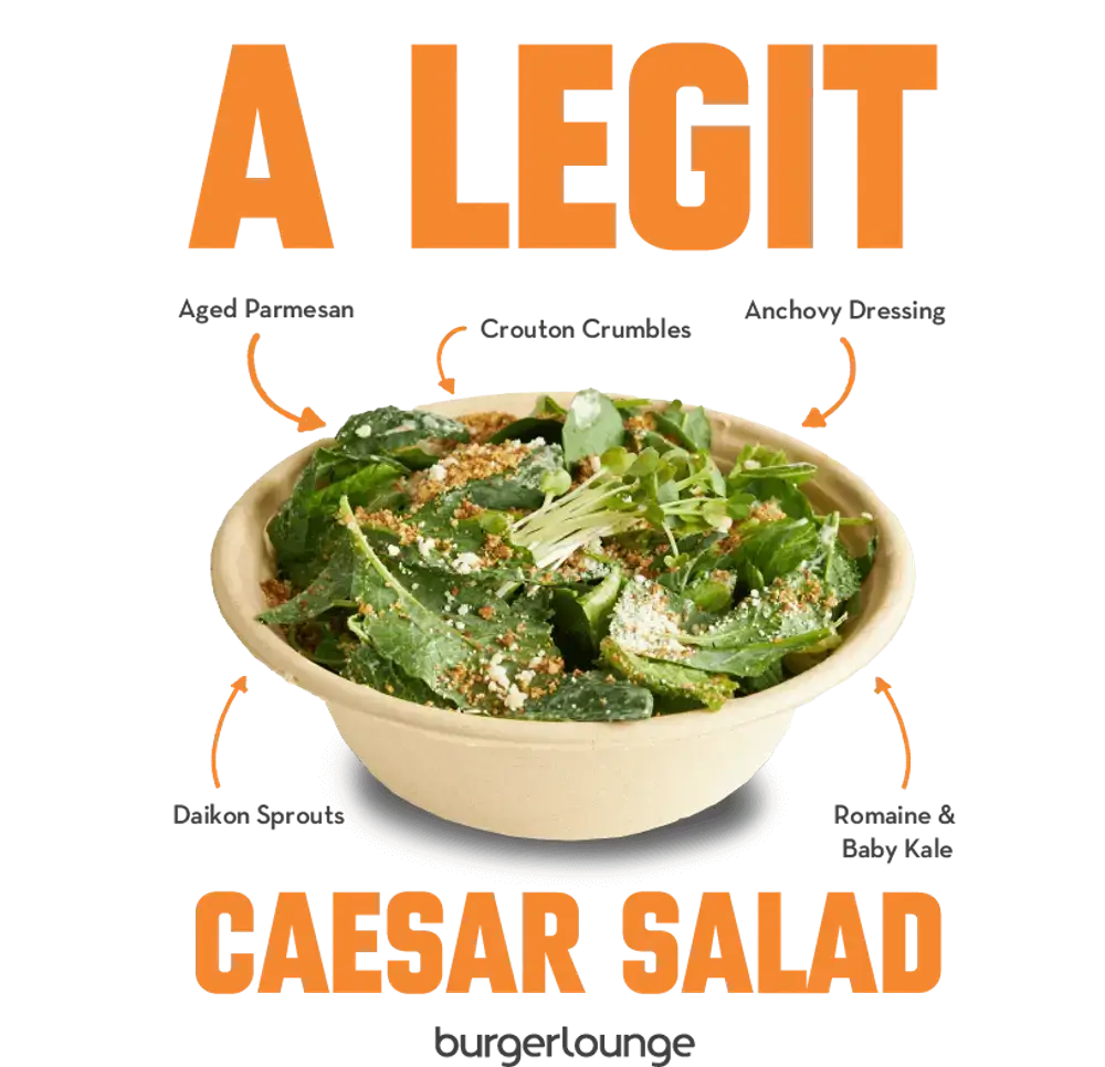 Promotional image of the Burger Lounge Caesar Salad pointing out ingredients on the salad - Mobile Version